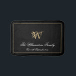 Elegant Monogram Family Last Name Newlywed Wedding Bath Mat<br><div class="desc">Elegant Monogram And Personalised Family Last Name Newlywed Gift Wedding Bath Mat. Cute stylish personalised black and gold monogrammed bath mat. Classic script for the monogrammed last name initial, and family last name, and the Est. Date on a chic black background. A perfect gift for newly weds, engaged couples, families...</div>