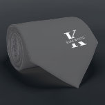 Elegant Monogram Grey | White Tie<br><div class="desc">An elegant necktie featuring a bold white monogram across a silver grey background. Atop this monogram sits your first or last name spelled out in all capitals.</div>