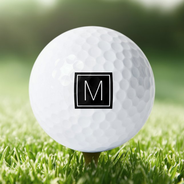 Elegant monogram initial on black square golf balls (Elegant monogram initial on black square golf balls)