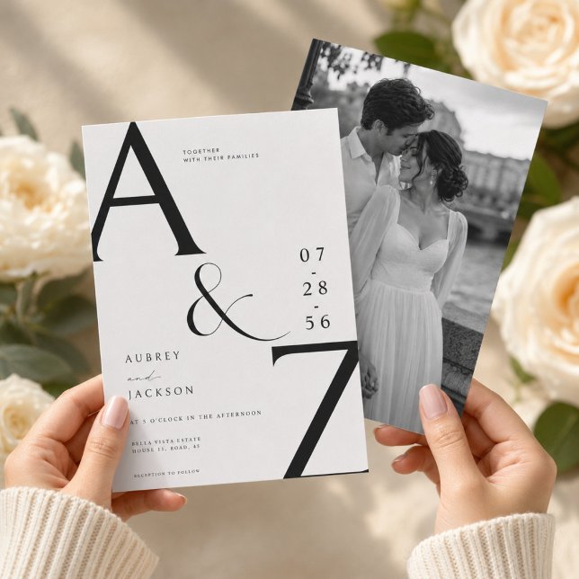 Elegant Monogram Wedding Invitation Template (Creator Uploaded)