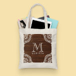 Elegant Monogram White Floral Lace Rustic Wood Tote Bag<br><div class="desc">Girly-Girl-Graphics at Zazzle: Elegant Monogram White Floral Lace Rustic Wood Tote Bag - Elegant Trendy Chic Stylish Vintage Floral Flowers White Lace Pattern on Rustic Wood Customisable for the Wedding Bride and or Bridesmaids to Personalise with a Trendy Modern Monogram Initial and Printed Typography Lettering makes a Uniquely Chic Addition...</div>