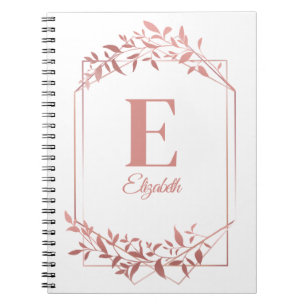 Elegant monogrammed rose gold frame leaves white notebook