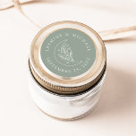 Elegant Moon and Stars Sage Green Wedding Favour Classic Round Sticker<br><div class="desc">Add a personalised touch to your envelopes, wedding favours, and more with these Elegant Moon and Stars sage green wedding stickers. The design features a white line art illustration of a moon adorned with stars and foliage on a sage green background. Your names and wedding date are displayed in white...</div>