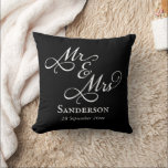 Elegant Mr and Mrs Wedding Black Cushion<br><div class="desc">Keep a memory of your special day close with this lovely black and white Mr and Mrs throw pillow! Featuring gorgeous script calligraphy with customisable names and wedding date, this pillow will be a beautiful keepsake for years to come. Also makes a beautiful personalised wedding or anniversary gift for couples...</div>