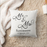 Elegant Mr and Mrs Wedding Cushion<br><div class="desc">Keep a memory of your special day close with this lovely Mr and Mrs throw pillow! Featuring gorgeous script calligraphy with customisable names and wedding date,  this pillow will be a beautiful keepsake for years to come. Also makes a beautiful personalised wedding or anniversary gift for couples or newlyweds!</div>