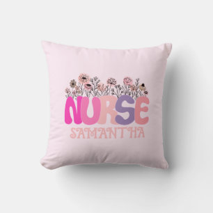 Elegant "Nurse" Typography with Vibrant Floral Cushion