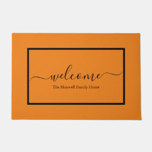 Elegant orange black script family name welcome  doormat