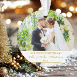 Elegant Our First Christmas Gold White 2 Photo Ornament<br><div class="desc">Elegant Script Our First Christmas Photo Ornament with Gold Script and Wedding Photo on Front & Back</div>