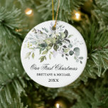 Elegant Our First Christmas Watercolor Greenery Ceramic Ornament<br><div class="desc">Modern Elegant Watercolor Greenery Couple Our First Christmas Ornament includes beautiful watercolor botanical greenery,  eucalyptus leaves other beautiful foliage.</div>