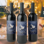 Elegant Peace Dove Sky Stars Blue White Christmas Wine Label<br><div class="desc">Give your Christmas wine gifts a stylish look with these personalised labels. The design depicts a beautiful dove, a traditional symbol of peace, in a dark blue sky with stars and snowflakes. The label is printed flat, yet the image may sometimes give an illusion of a papercraft bird flying out...</div>