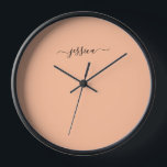 Elegant peach fuzz script name large clock<br><div class="desc">Modern clock with an orange (peach fuzz) background and a hand lettered black girly script name. Personalise with your name</div>