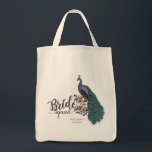 Elegant Peacock Bride Squad Tote Bag<br><div class="desc">This Elegant Peacock Bride Squad Tote Bag features a hand-drawn blue and teal peacock perched on Magnolia branches in full bloom in black ink and the title "Bride Squad". Personalise with your city and date by clicking on "Personalise this template" on the product page.</div>