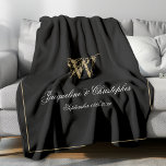 Elegant Personalised Newlywed Keepsake Monogram Fleece Blanket<br><div class="desc">Elegant Chic Black Personalised Newlywed Keepsake Monogram Fleece Blanket. Personalised black and gold monogrammed Fleece Blanket. Classic romantic script for the initial, the names of the bride and groom, and the wedding date on a simple elegant black background. A perfect gift idea for a wedding gift, a newly weds gift,...</div>