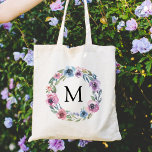 Elegant Pink and Purple Floral Wreath Monogra Tote Bag<br><div class="desc">Step up your tote game with our stylish Midnight Blooms personalised tote bags. The elegant tote bag features your custom monogram or initial surrounded by a wreath of watercolor roses in shades of purple, mauve & blue with lush green leaves. The floral wreath tote bags are perfect for the bride-to-be,...</div>