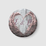 Elegant pink flower heart rustic barn wood wedding magnet<br><div class="desc">This beautiful elegant, classic and modern wedding item features a heart made of real “bridal wreath” Spirea Flowers. The couple's initials looks really cute nestled inside the heart. I put the heart on a rustic, distressed, grey barn wood background with dusty rose pink accents. Very easy to customise. This item...</div>