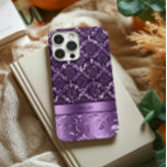 Elegant Purple Floral Damask Metallic Texture iPhone 14 Pro Case<br><div class="desc">Elegant purple and black floral lace damasks pattern with metallic texture print accent.
Customisable monogram.</div>