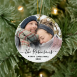 Elegant Script Couple Name Photo Merry Christmas   Ceramic Ornament<br><div class="desc">Elegant Modern Black White Hand Lettered Script "Couple Name" Merry Christmas Photo Ornament. Features a family photo, "Couple Name" calligraphy text in handwritten script, with Merry Christmas text and year photo overlay (in black and white). Easy to personalise it. Photo tip: crop your photo to square form before upload it....</div>