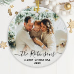 Elegant Script Family Name Photo Merry Christmas   Ceramic Ornament<br><div class="desc">Elegant Modern Black White Hand Lettered Script "Family Name" Merry Christmas Photo Ornament. Features a family photo, "family name" calligraphy text in handwritten script, with Merry Christmas text and year photo overlay (in black and white). Easy to personalise it. Photo tip: crop your photo to square form before upload it....</div>