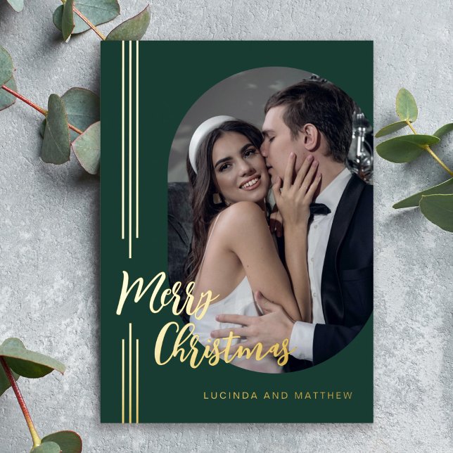 Elegant Script Minimal Photo Merry Christmas Foil Holiday Card (An elegant gold foil accented holiday card with oval photo template.)