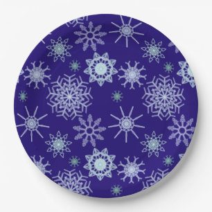 Elegant snowflake pattern on deep blue background paper plate