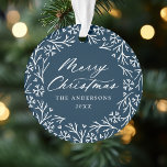 Elegant Snowflake Wreath Navy Christmas Photo  Ornament<br><div class="desc">Elegant holiday photo ornament featuring "Merry Christmas" displayed in a white calligraphy script encircled by a wreath of snowflakes and pine branches on a navy background. Personalise the front of the ornament by adding your family name and the year. The back of the ornament features your favourite family photo making...</div>