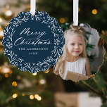 Elegant Snowflake Wreath Navy Photo Christmas Tree Decoration Card<br><div class="desc">Elegant holiday photo ornament card featuring "Merry Christmas" displayed in a white calligraphy script encircled by a wreath of snowflakes and pine branches on a navy background. Personalise the front of the ornament card by adding your family name and the year. The back of the paper ornament features your favourite...</div>