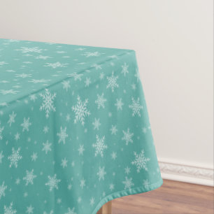 Elegant Snowflakes on Teal Tablecloth
