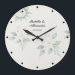 Elegant Watercolor Floral Wedding Personalised Large Clock<br><div class="desc">Add a touch of timeless romance to your home with this elegant, personalised wall clock. Featuring delicate white flowers and green leaves in a watercolor style, this botanical design perfectly captures the popular soft cottagecore and modern romantic aesthetics. The soft florals are beautifully anchored by deep blue typography and matching...</div>