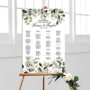 Elegant wedding seating chart with greenery