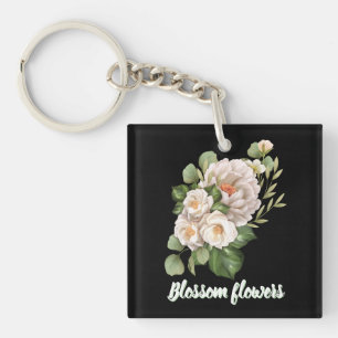 Elegant white floral bouquet with green leaves key ring