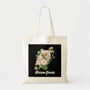 Elegant white floral bouquet with green leaves tote bag