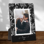 Elegant White Floral on Black Easel-Back Photo Plaque<br><div class="desc">Tabletop plaque with a built-in easel features your favourite photo surrounded with a beautiful border of white foliage, dots and berries on a black background. CHANGE the LOVE text to anything - TIP: put your text between the two squares to retain the text swashes. Great as a gift or to...</div>