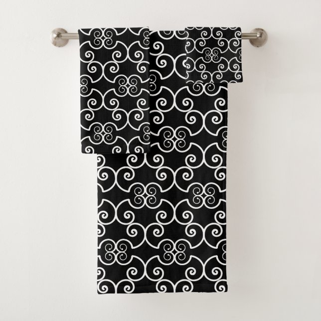 Elegant white spiral design pattern on black bath towel set (Insitu)