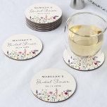 Elegant Wildflower Meadow Cream Bridal Shower Round Paper Coaster<br><div class="desc">Elegant floral bridal shower paper coasters featuring a bottom border of watercolor wildflowers and foliage in shades of pink, yellow, purple, blue, and green on a cream background. Personalise the wildflower bridal shower coasters with the bride-to-be's name and the date. The personalised wildflower coasters are perfect for spring and summer...</div>