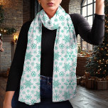 Elegant Winter Teal Snowflake Christmas Scarf<br><div class="desc">Wrap yourself in holiday elegance with this beautiful chiffon scarf featuring a delicate teal snowflake pattern. Perfect for adding a festive touch to any winter outfit, this lightweight and breatheable scarf is ideal for both casual and formal occasions. Whether you’re gifting or keeping it for yourself, the timeless snowflake design...</div>