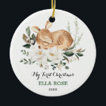 Elegant Woodland Deer Baby First Christmas Ceramic Ornament<br><div class="desc">This design features watercolor illustration of an adorable baby deer surrounded by lush greenery and ivory magnolia flowers. Use the template fields to add your details. If you want to change the font style,  colour or text placement,  simply click the "Customise Further" button.</div>