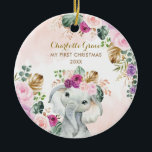 Elephant Baby 1st Christmas Blush Floral Greenery Ceramic Ornament<br><div class="desc">Adorable jungle-themed ceramic ornament featuring a sweet baby elephant and elegant watercolor tropical greenery and flowers in blush and violet. Matching items available in our store!</div>