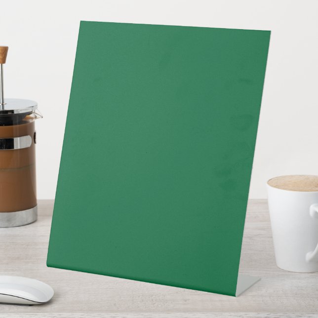 Elevate your Web Design with a Green Background Pedestal Sign (In SItu)