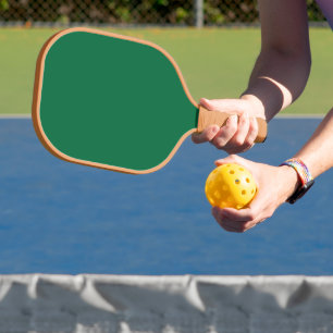 Elevate your Web Design with a Green Background Pickleball Paddle