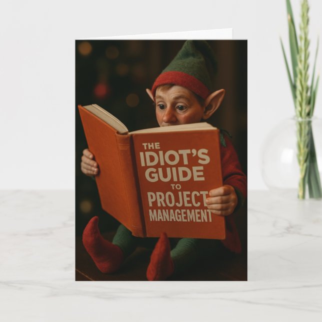Elf reading 'Idiots Guide to Site Management' Card (Front)