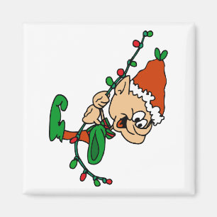 elf swinging on lights magnet