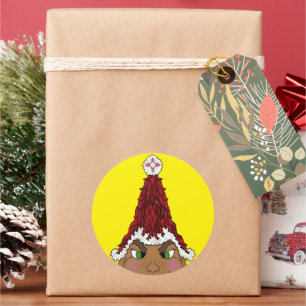 Elf wearing a Red Chile Santa Hat with a Zia Classic Round Sticker