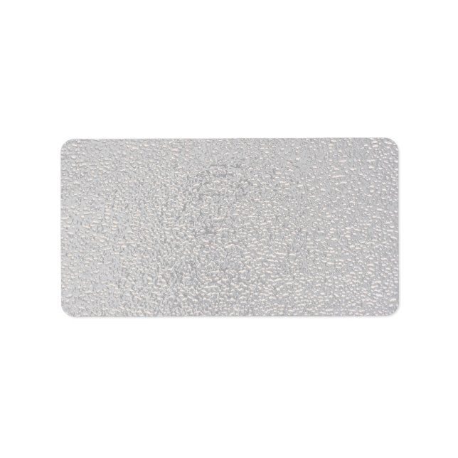 Embossed silver label (Front)