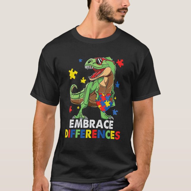 Embrace Differences Autism Awareness Dinosaur Puzz T-Shirt (Front)