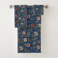 Embroidered plain wildflowers on denim background