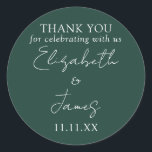 Emerald Green Elegant Script Wedding Thank You Classic Round Sticker<br><div class="desc">This demerald green minimalist elegant script wedding thank you sticker can be personalised with your information in chic typography. Designed by Thisisnotme©</div>