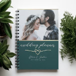 Emerald Green Photo Wedding Planner Book<br><div class="desc">Plan your dream day in style with this elegant emerald green wedding planner notebook. Features a custom photo at the top, gold calligraphy script, and a romantic intertwined heart design. Personalise with names and your wedding date. Perfect for organising every detail — from guest lists to timelines — in one...</div>