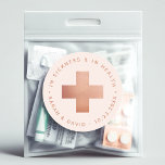 Emergency Blush Pink Rose Gold Cross Hangover Kit Classic Round Sticker<br><div class="desc">A sticker for the Emergency Kit (aka Hangover Kit) to put in a destination wedding welcome bag, with some medicine inside. It has a (faux) rose gold cross in the centre and arched text making a circle around it. Above it, there is the message "In sickness and in health" and...</div>