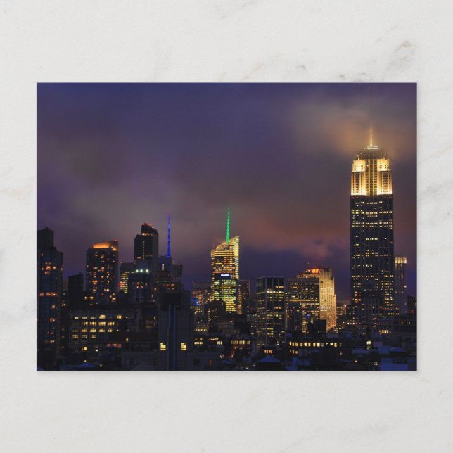 Emp St Bldg glows in clouds and fog Postcard (Front)