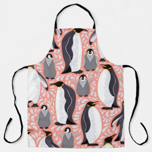 Emperor penguins and their cubs on a pink patterne apron